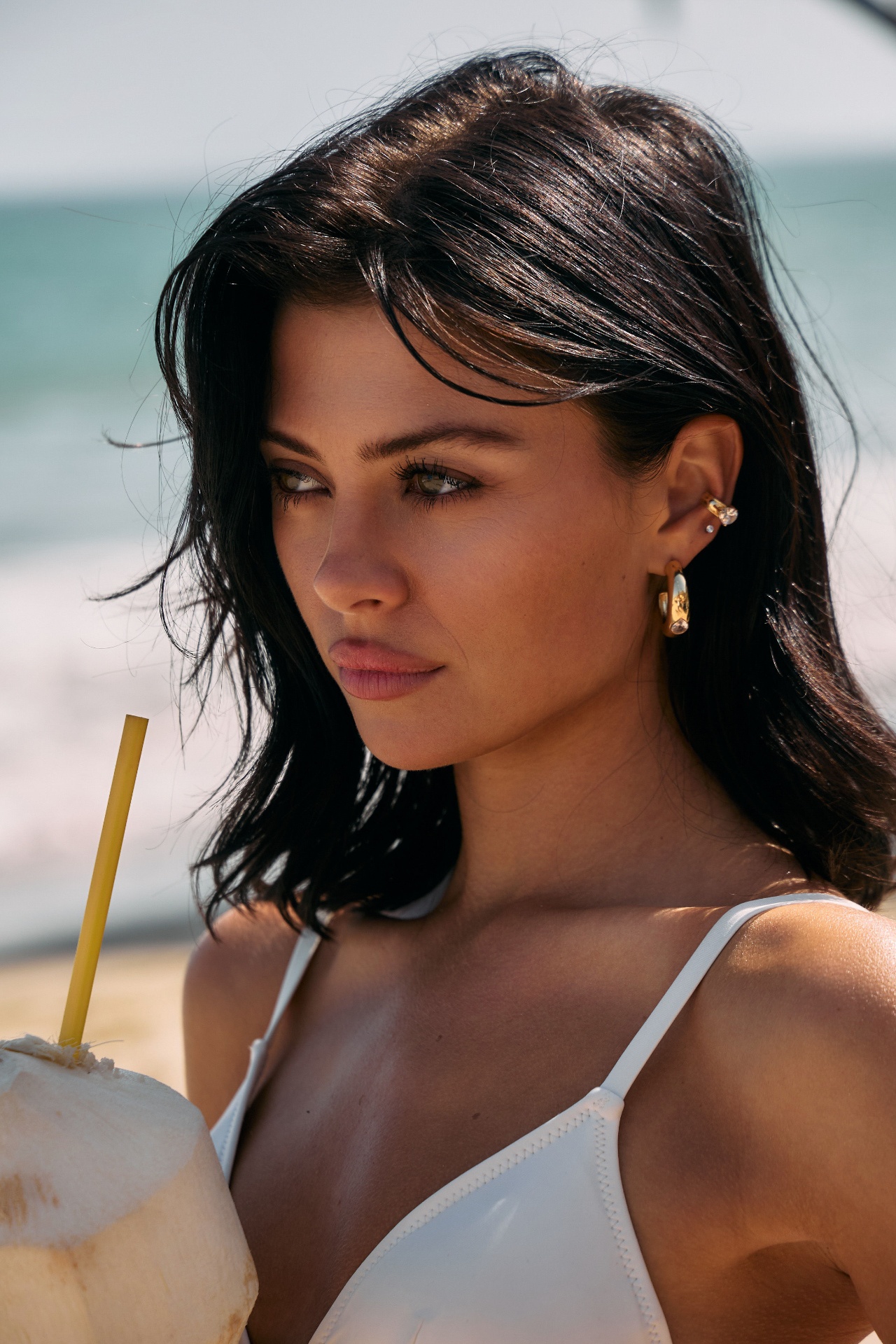 Beach beauty portrait with coconut