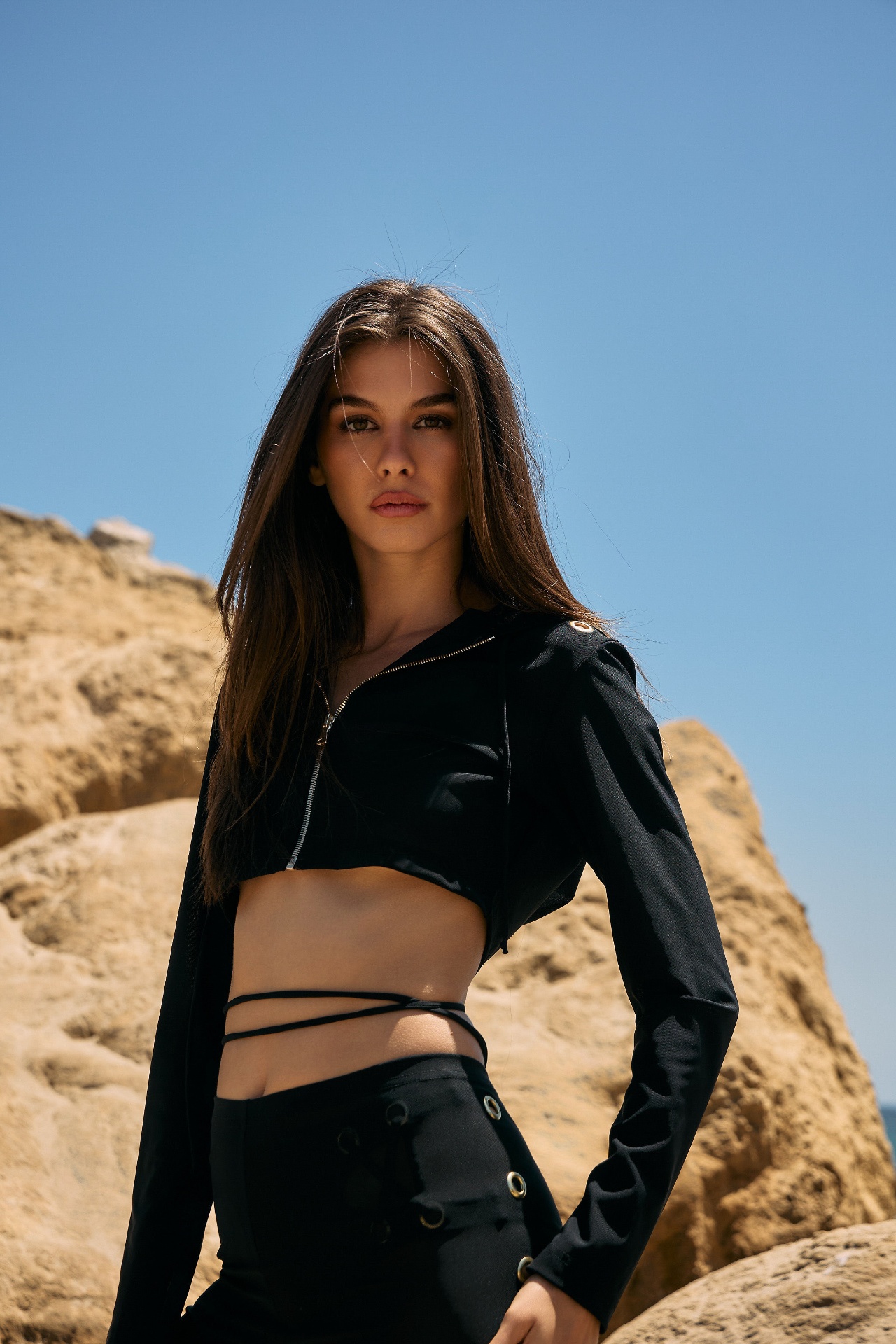 Editorial portrait on coastal rocks